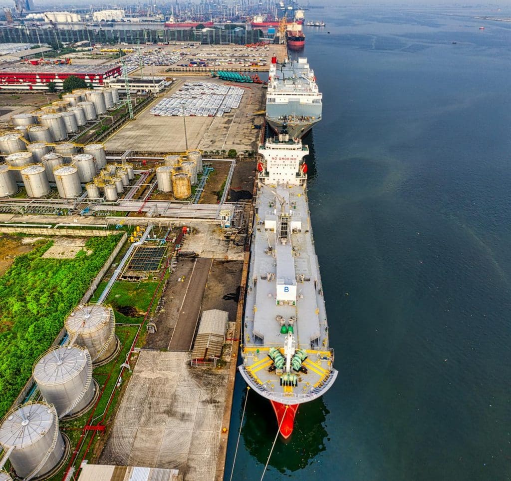 drone-shot-of-a-docked-oil-tanker-3856438 Aerial shot of oil tankers and storage facility in North Jakarta, Indonesia.
